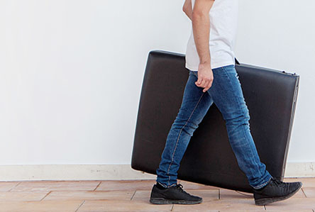 BodyMed Portable Massage Tables - Man carrying table