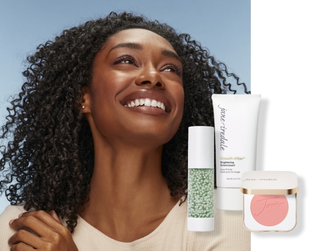 Woman smiling with jane iredale products in foreground